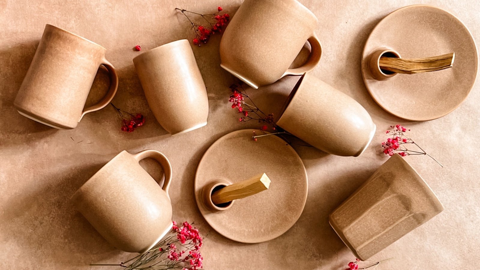 Handmade ceramic vessels styled in an elevated hospitality setting