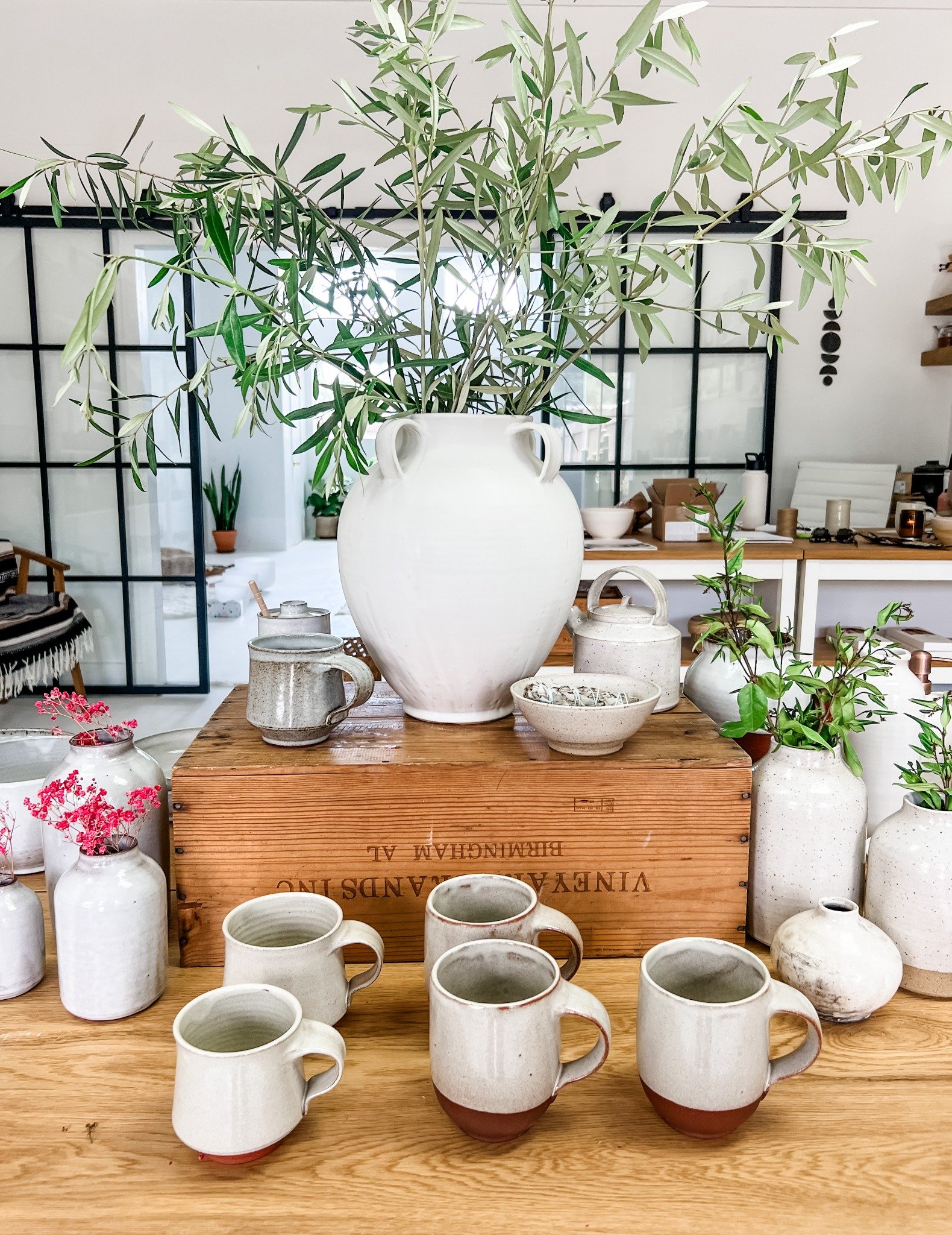 A collection of handmade Ritual Ceramics arranged in the Ojai studio