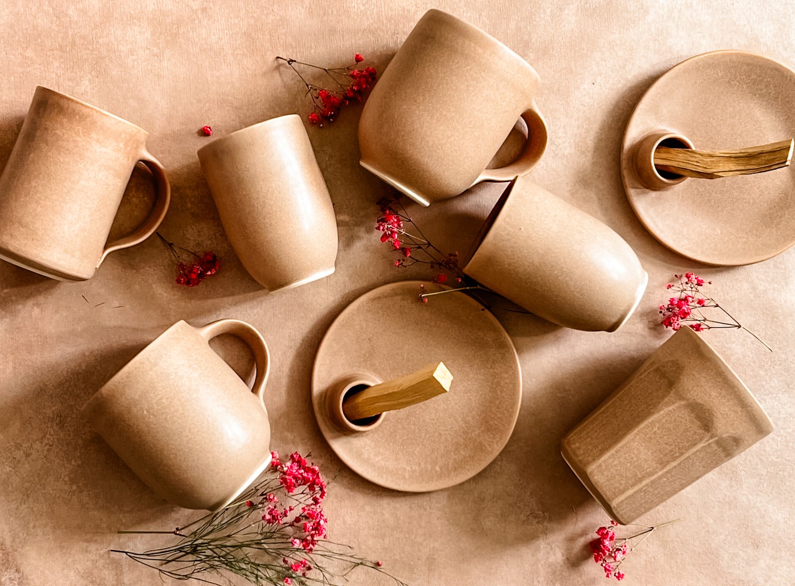 Warm taupe handmade mugs, tumblers, incense plates, and serving pieces from the Sespe Collection