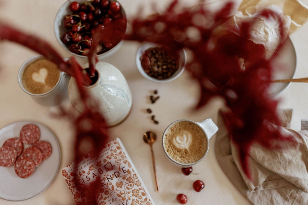 Coffee and handmade ceramics styled with warm Ojai colors